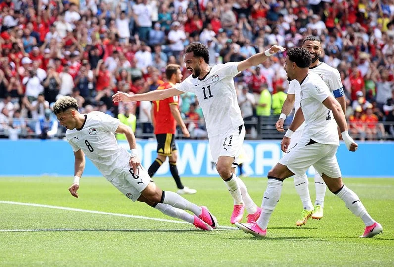 Giocatori festeggiano un gol durante la partita dei Mondiali 2026.
